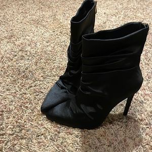 Black high heels boots